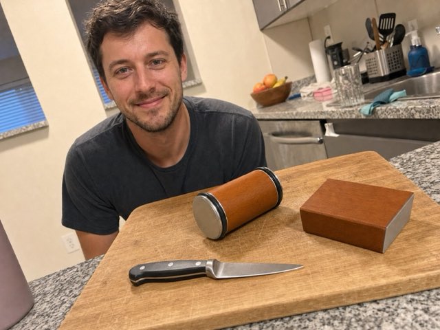 Customer at a kitchen island with a paring knife, the Keldley roller and the angle block